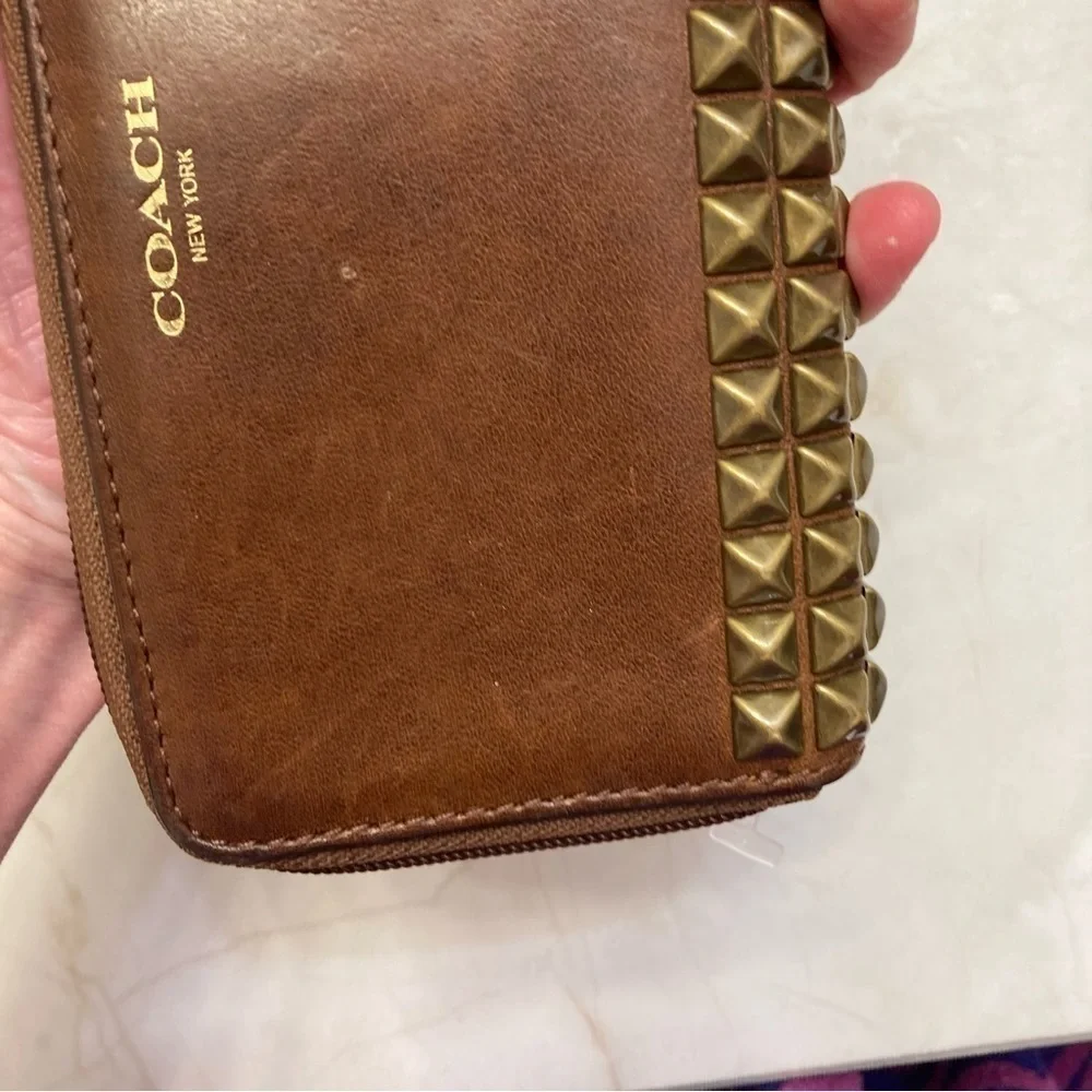 Coach brown weathered leather wristlet wallet